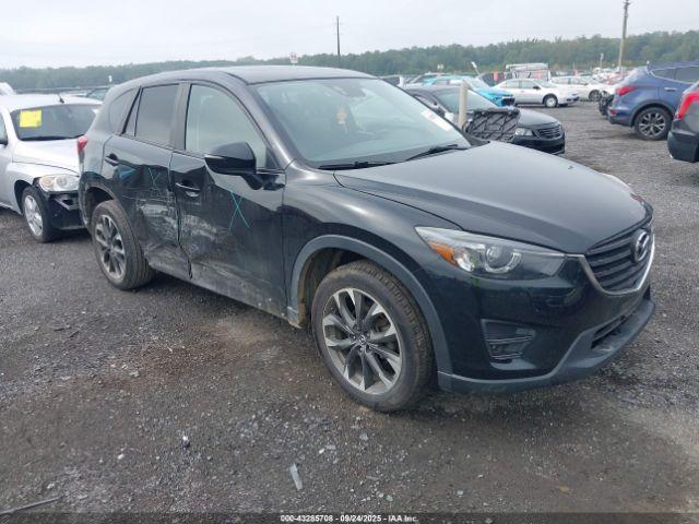  Salvage Mazda Cx