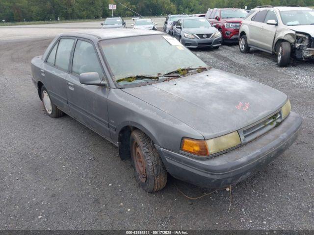  Salvage Mazda Protege